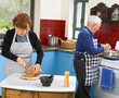 senior couple cooking