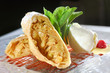 vanilla ice-cream with a baked apple strudel