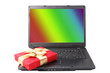 red gift box lies on the laptop keyboard