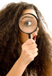 beautiful woman with her magnifing her eye beautiful woman with her magnifing her eye