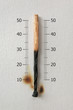 Photo: burning match on thermometer scale burning match on thermometer scale