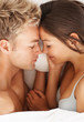 Closeup portrait of a young intimate couple fast asleep in bed