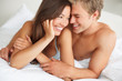 Passionate couple enjoying on the bed