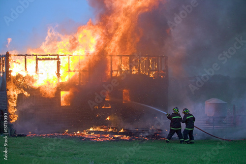 Photo: Firefighters taking control Firefighters taking control