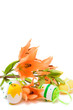 easter egg and orange lily isolated on white