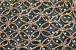 texture mailles et paillettes sur fond de tissu aux fils d'or