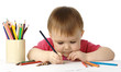 Child draw with crayons