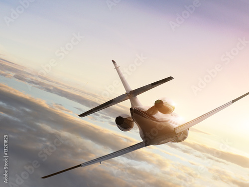 Photo: Jet plane at fly to the sunset Jet plane at fly to the sunset