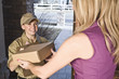 Photo: courier delivering package courier delivering package