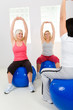 Elder women exercising on fitness balls