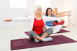 Women working out on mat