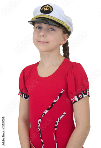 Photo: Young girl in uniform cap Young girl in uniform cap