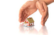 Hands and little house.