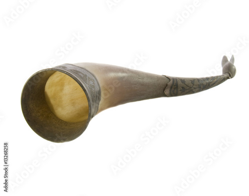 Photo: Bone national horn of plenty decorated with silver stamping isol Bone national horn of plenty decorated with silver stamping isol