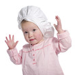 Toddler with a chefs hat.