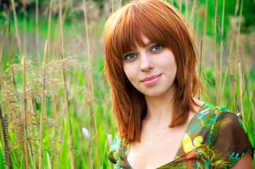Photo: Portrait of a beautiful woman with red hair Portrait of a beautiful woman with red hair