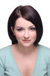 Attractive brunette girl smiling on white background