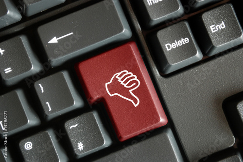 Illustration: "Thumbs Down" key on keyboard "Thumbs Down" key on keyboard