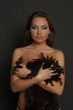 babe with feathers