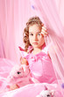 Foto: Beautiful little girl in pink barbie style Beautiful little girl in pink barbie style