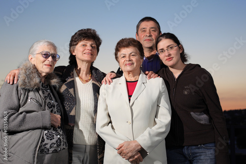 Photo: Portrait of a happy family together outdoors Portrait of a happy family together outdoors