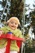 Baby girl in swing