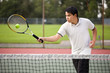 Photo: Asian tennis player Asian tennis player