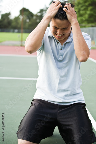 Photo: Disappointed tennis player Disappointed tennis player