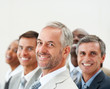 Group of business people smiling over grey background