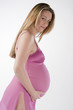 Image of pregnant woman touching her belly with hands..