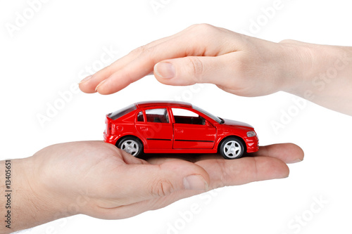 Red car in hands