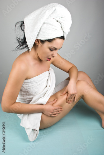 Photo: Surprised woman checking cellulite Surprised woman checking cellulite