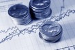 coins and financial graph