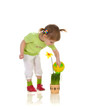 Cute little girl watering flower Cute little girl watering flower