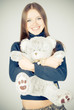 Beautiful blonde teenager holding a teddy bear Beautiful blonde teenager holding a teddy bear