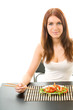 Woman with chopsticks eating salad with shrimp and pepper, isola Woman with chopsticks eating salad with shrimp and pepper, isola