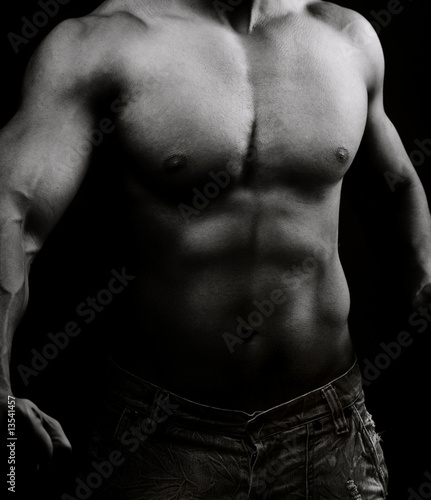 Photo: Artistic image of muscular male body Artistic image of muscular male body