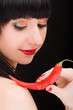 cute girl with chili pepper