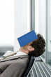 Man sleeping with book on his face Man sleeping with book on his face