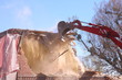 house demolish by digger
