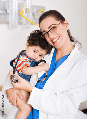 Photo: pediatrician and baby boy pediatrician and baby boy