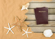sand and wood background with passport sand and wood background with passport