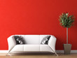 interior design of white couch on red wall