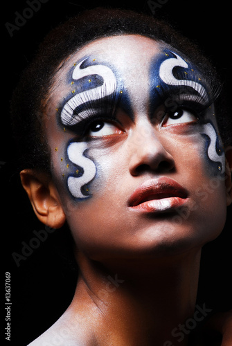 Photo: Portrait of mulatto girl with face-art Portrait of mulatto girl with face-art