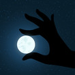 vector hand holding the moon vector hand holding the moon