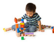 Cute preschool boy playing with wooden blocks. Cute preschool boy playing with wooden blocks.