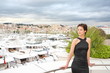 Beautiful model on the balcony of Palais des Festivals in Cannes