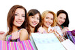 Beautiful young happy people with gift