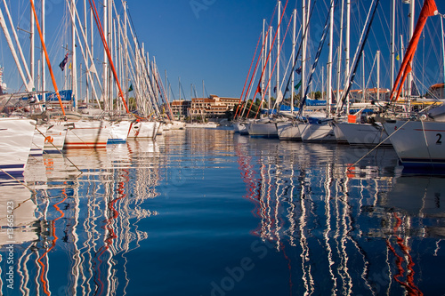 Photo: Row of sailing boats Row of sailing boats