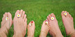 Family lying on grass Family lying on grass